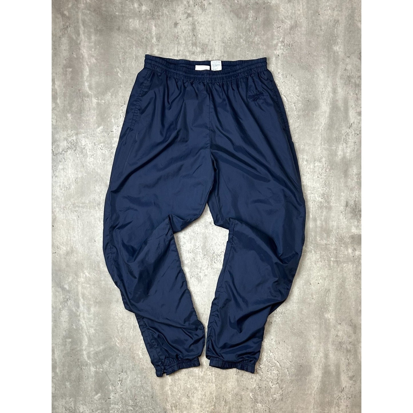 Vintage 90s Reebok Tonal Embroidered Logo Nylon Track Pants Size Medium Blue