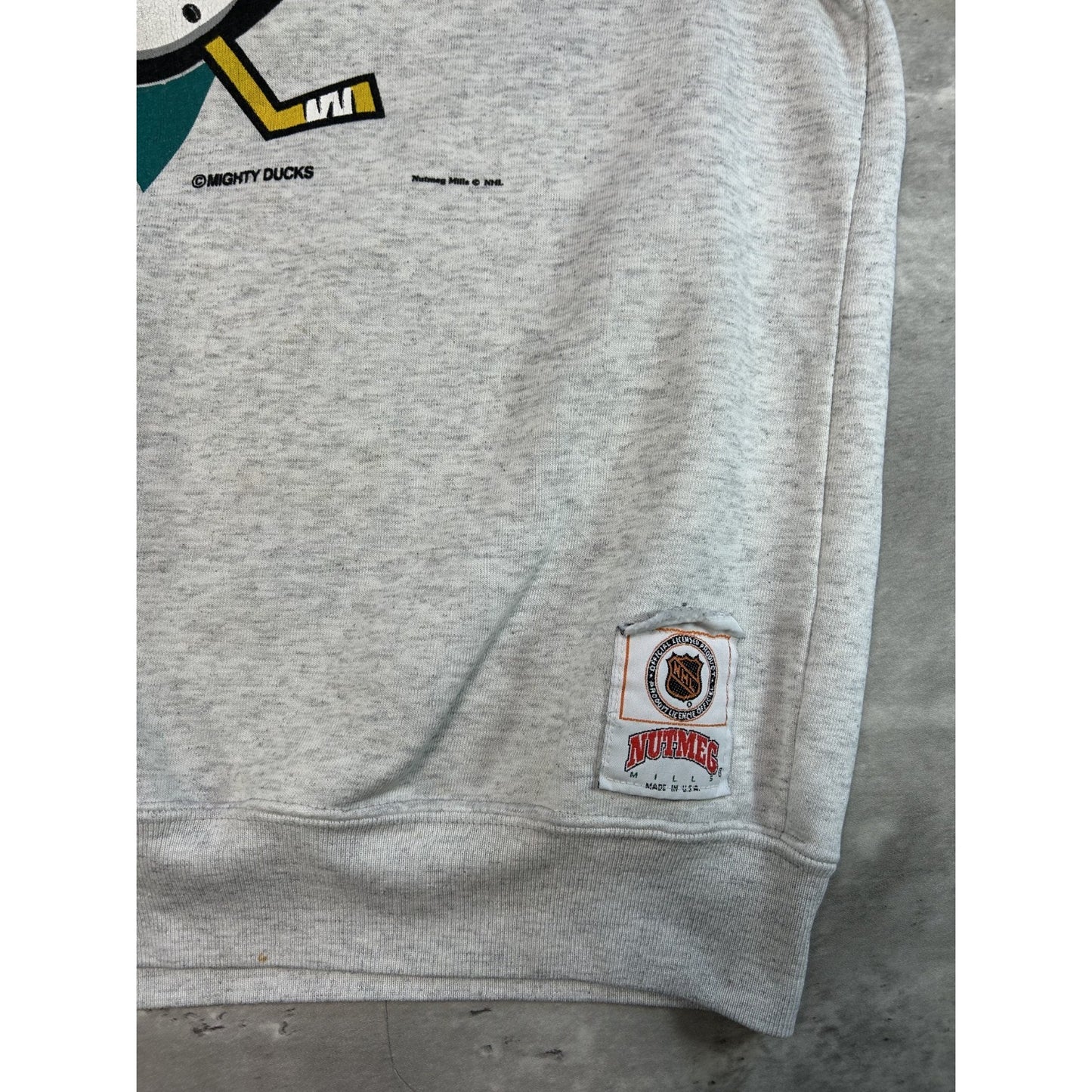 Vintage 90s Anaheim Ducks NHL Graphic Spellout Logo Hockey Sweatshirt Size XL