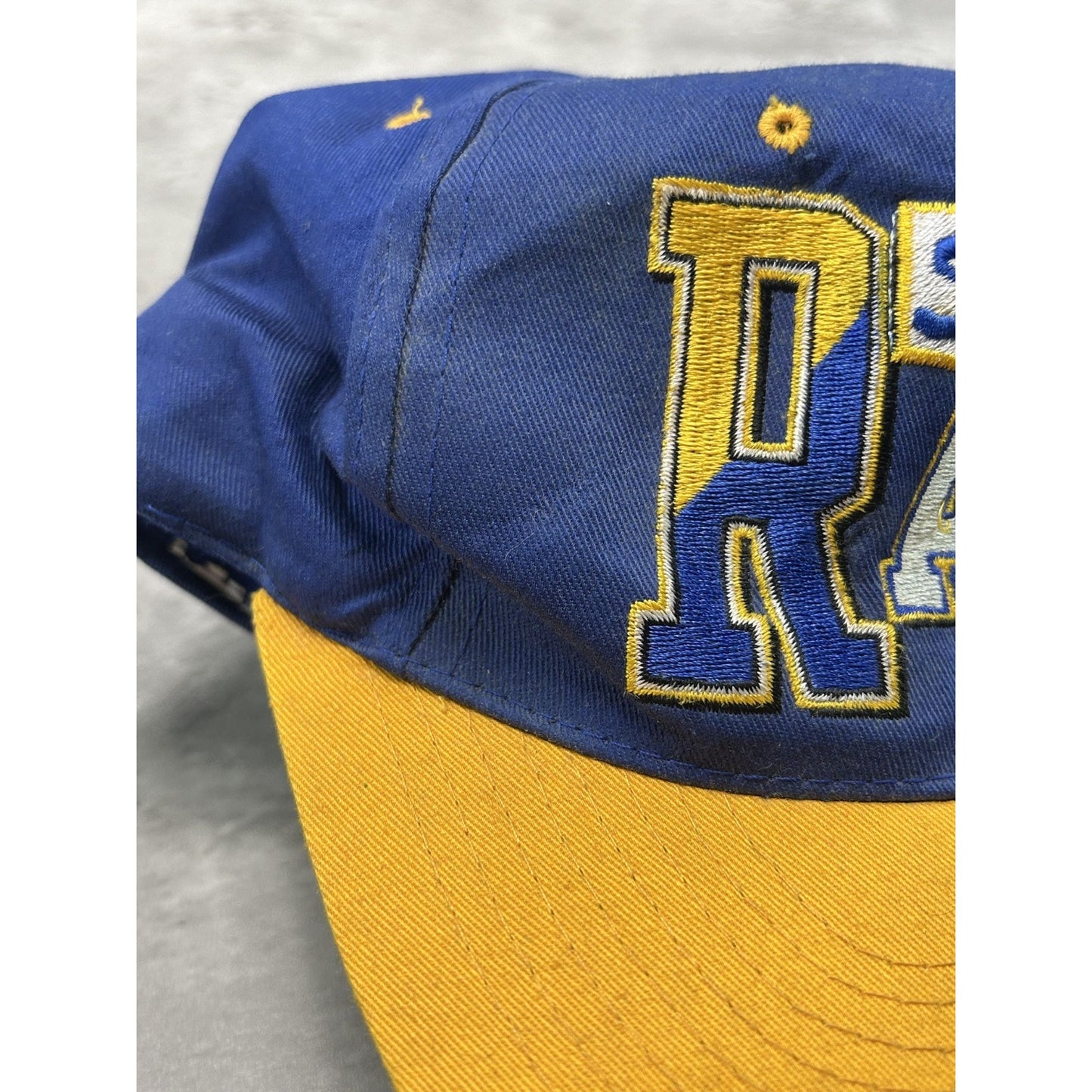 Vintage 90s St Louis Rams NFL Embroidered Spellout Snapback Hat OSFA
