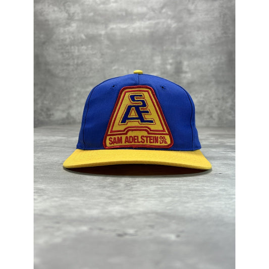 Vintage 90s Sam Adelstein Embroidered Spellout Logo Snapback Hat OSFA
