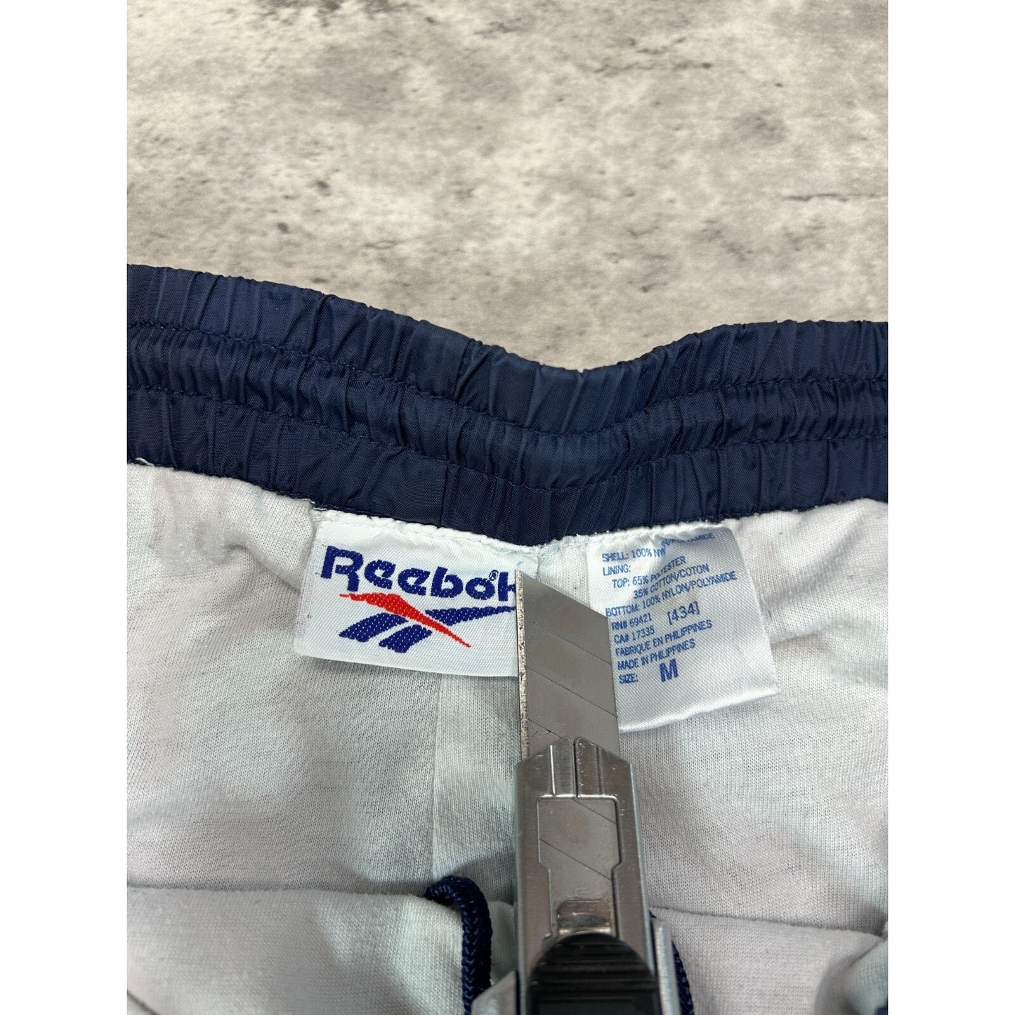 Vintage 90s Reebok Tonal Embroidered Logo Nylon Track Pants Size Medium Blue