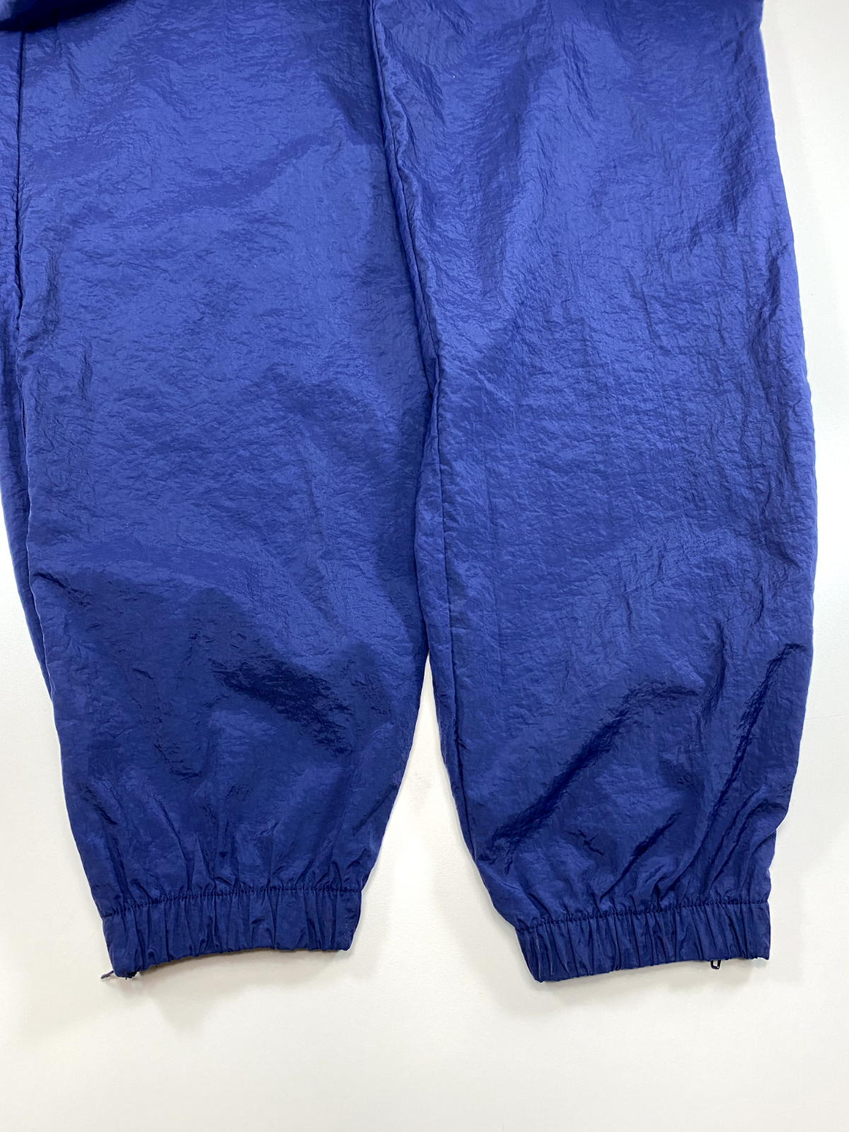 Vintage 90s Nike Embroidered Swoosh Nylon Windbreaker Pants Size 28W Blue