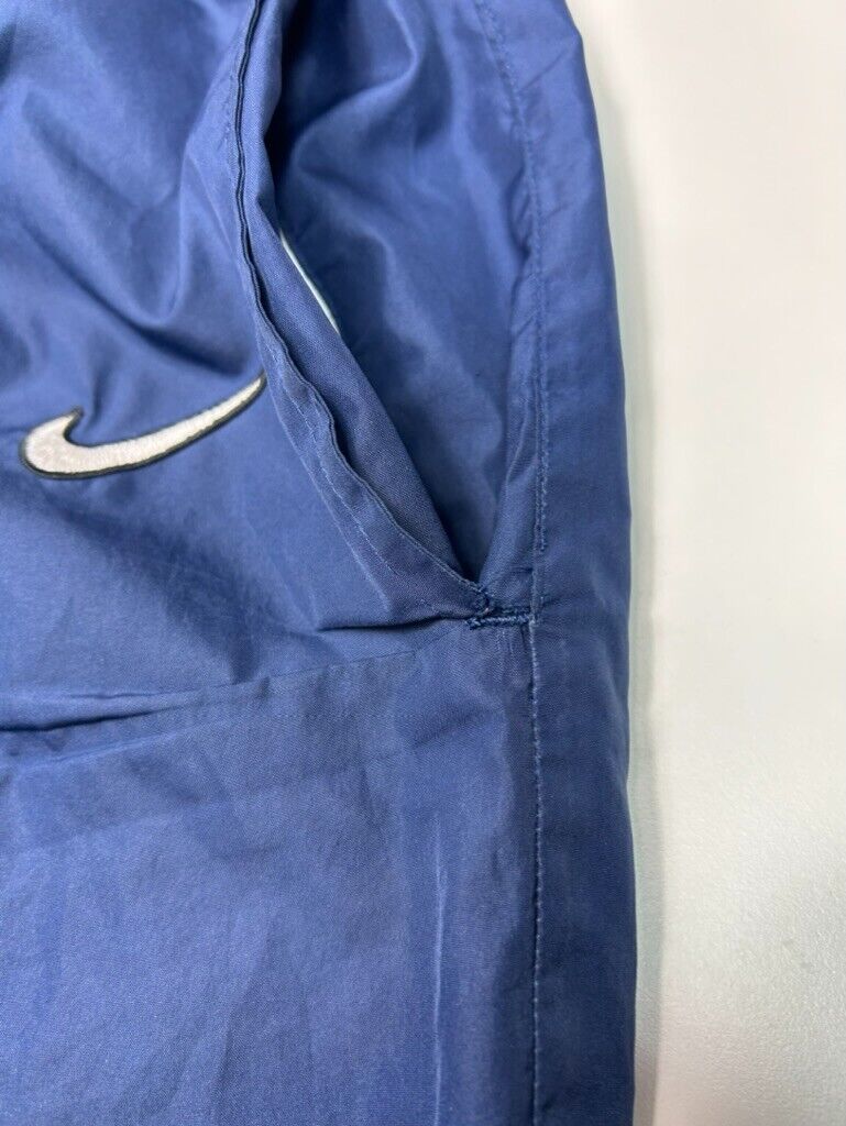 Vintage Y2K Nike Embroidered Swoosh Nylon Windbreaker Pants Size 2XL Blue