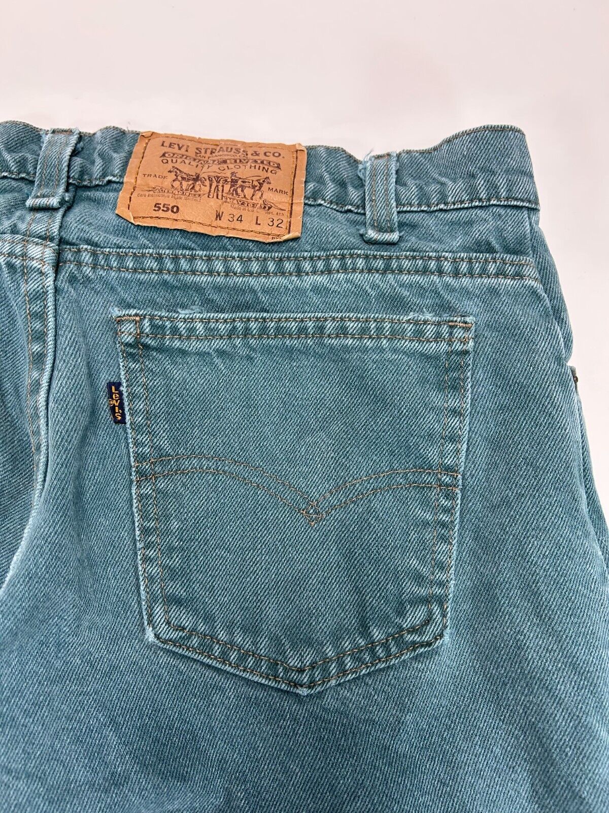 Vintage 90s Levis 550 Blue Tab Teal Wash Denim Pants Size 32W