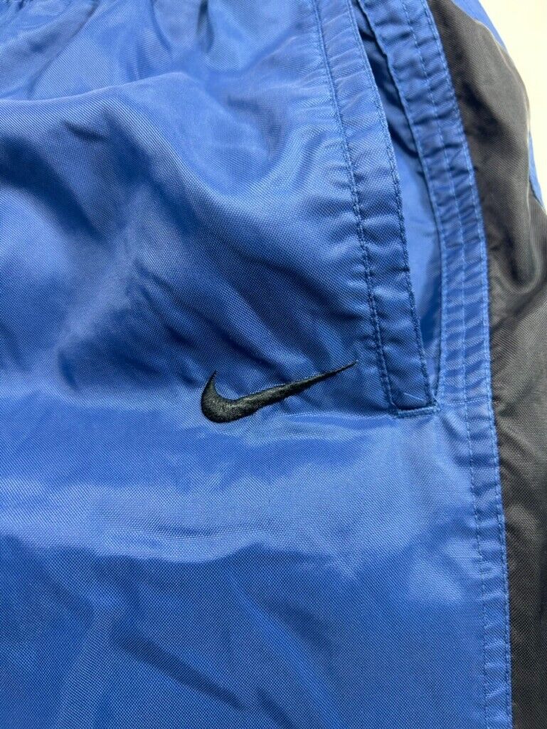 Vintage Y2K Nike Embroidered Mini Swoosh Nylon Windbreaker Pants Size XL Blue