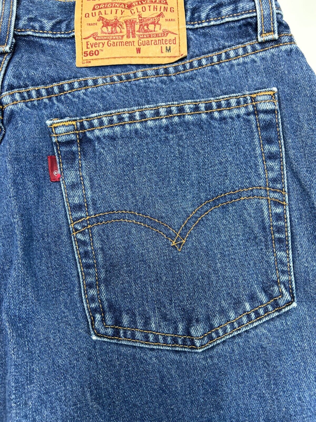 Vintage Levis 560 Red Tab Dark Wash Denim Pants Size 32W Blue