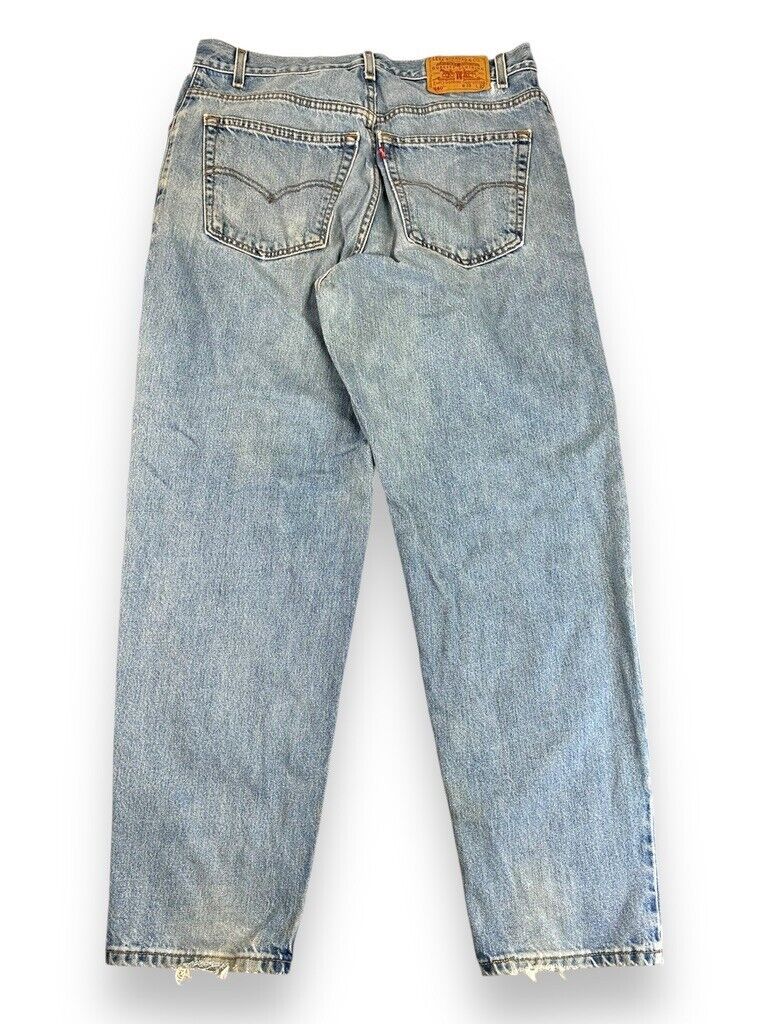 Vintage 90s Levis 560 Loose Fit Light Wash Denim Pants Size 34