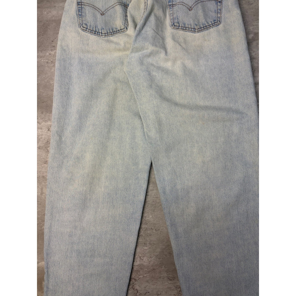 Vintage 90s Levis 560 Red Tab Relaxed Fit Tapered Light Wash Denim Pants Size 35