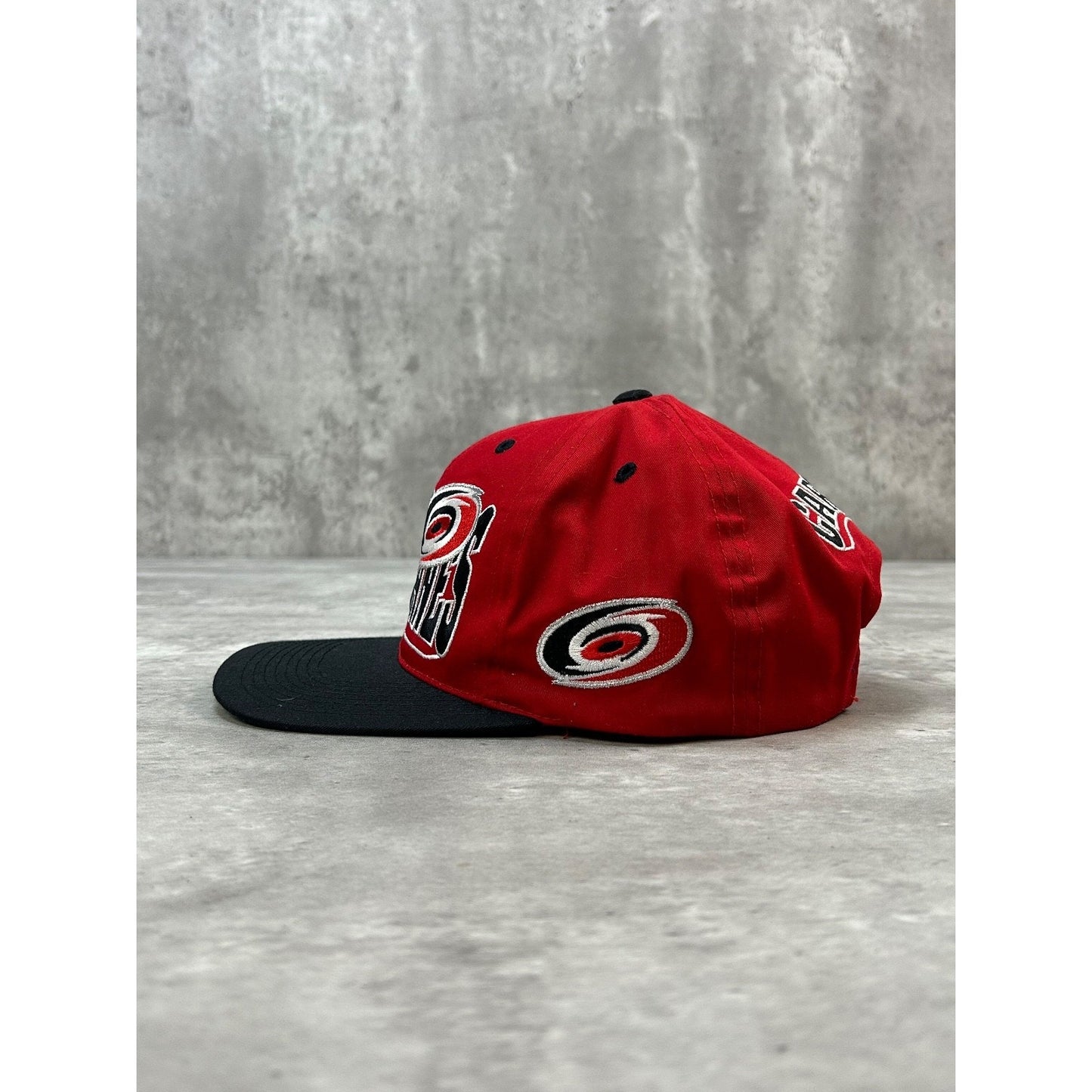 Vintage 90s Carolina Hurricanes NHL Embroidered Wave Spellout Snapback Hat OSFA