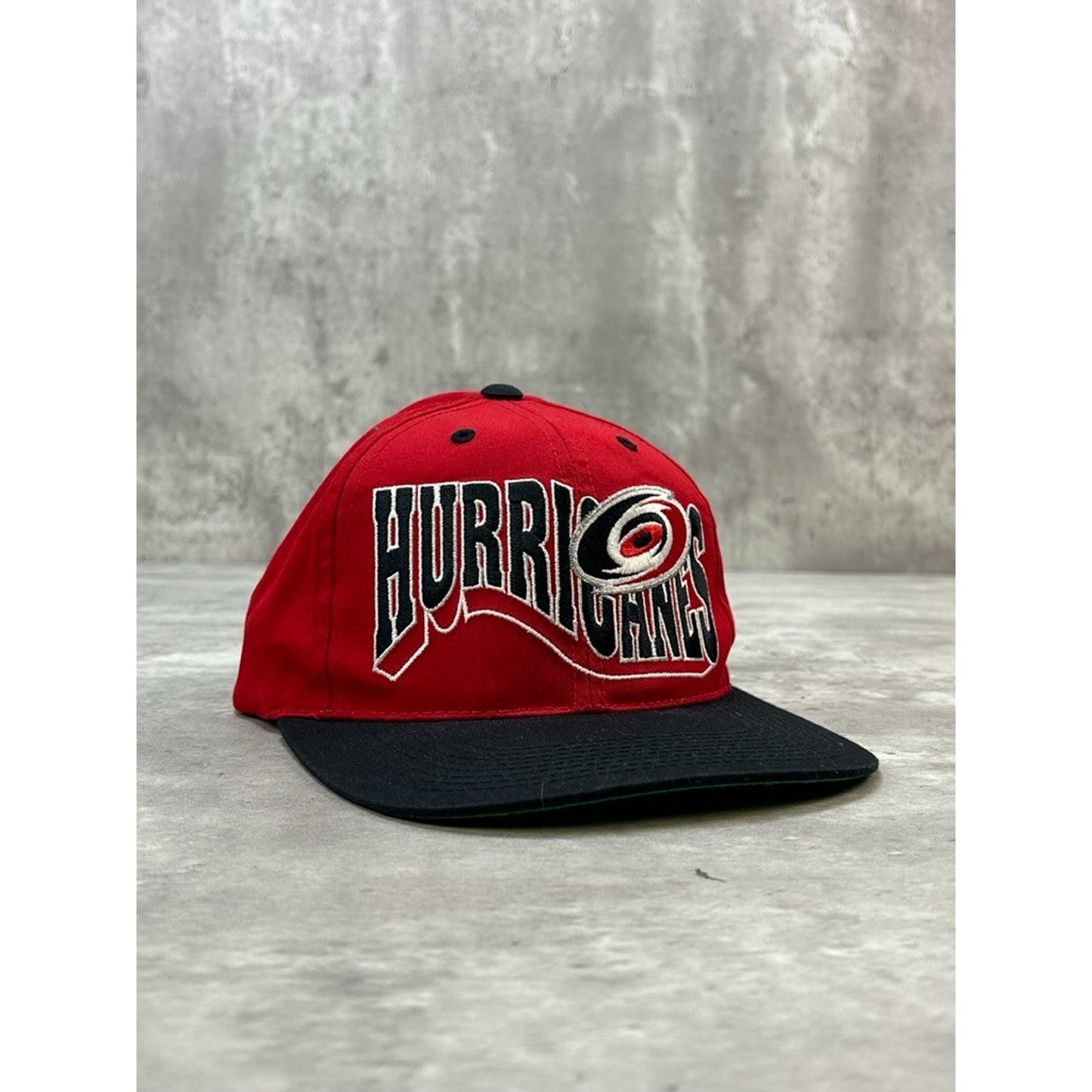 Vintage 90s Carolina Hurricanes NHL Embroidered Wave Spellout Snapback Hat OSFA