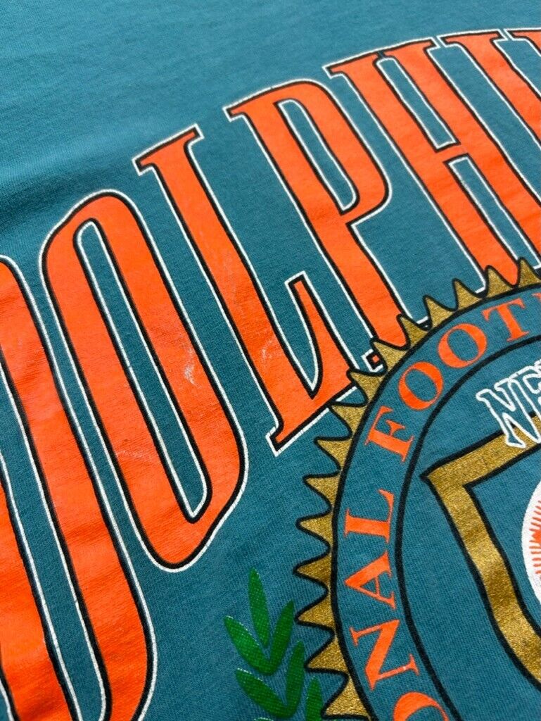 Vintage 90s Miami Dolphins NFL Spellout Crest Nutmeg Graphic T-Shirt Size Large