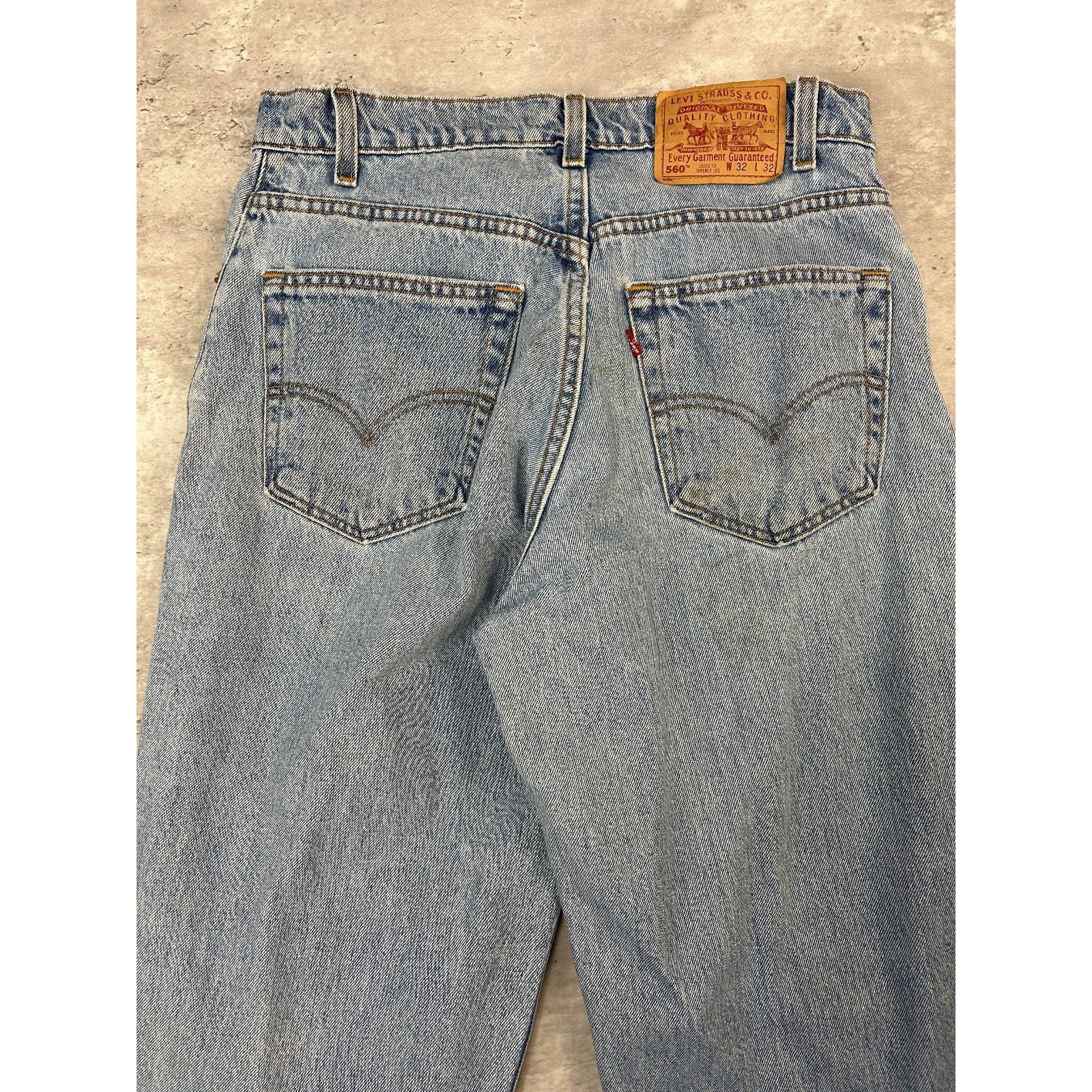 Vintage 90s Levis 560 Red Tab Loose Fit Light Wash Denim Pants Size 31 Blue