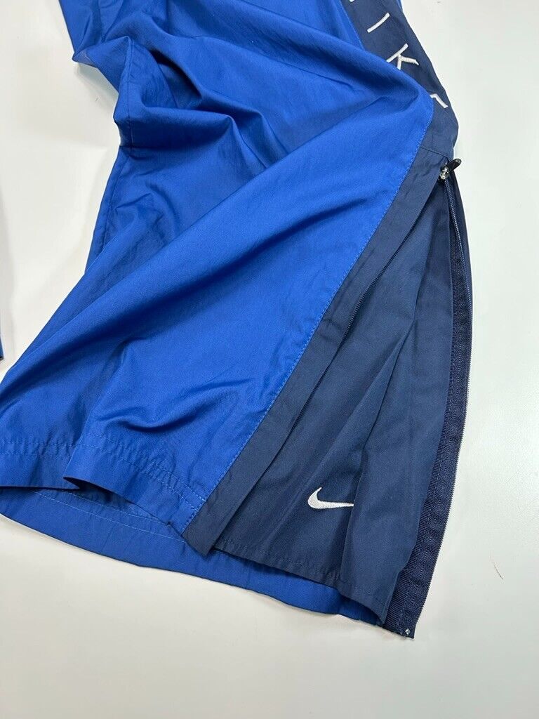 Vintage Y2K Nike Embroidered Spell Out Nylon Windbreaker Pants Size Small Blue