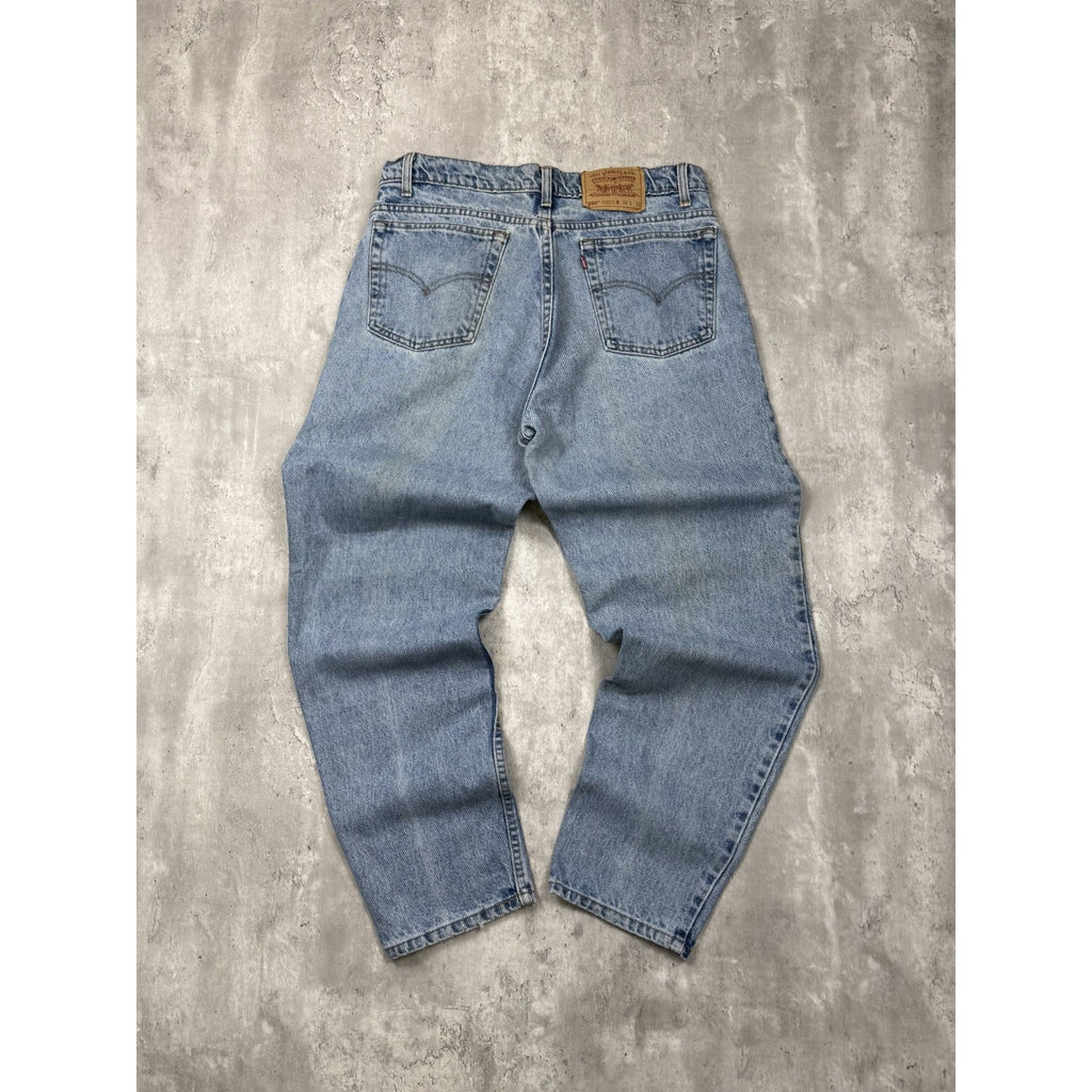 VTG 90s Levis 550 Red Tab Relaxed Tapered Leg Medium Wash Denim Pants Size 34