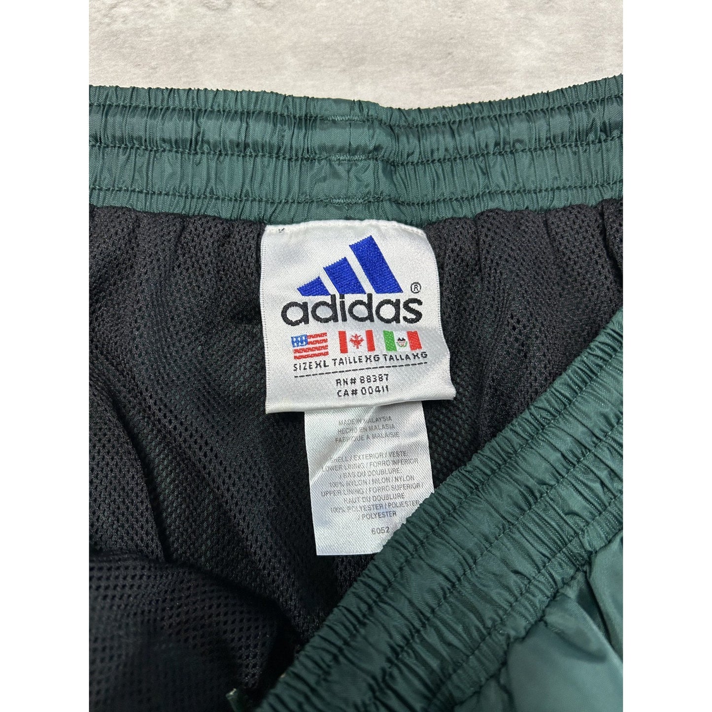 Vintage 90s Adidas Embroidered Spellout Three Stripe Nylon Track Pants Size XL