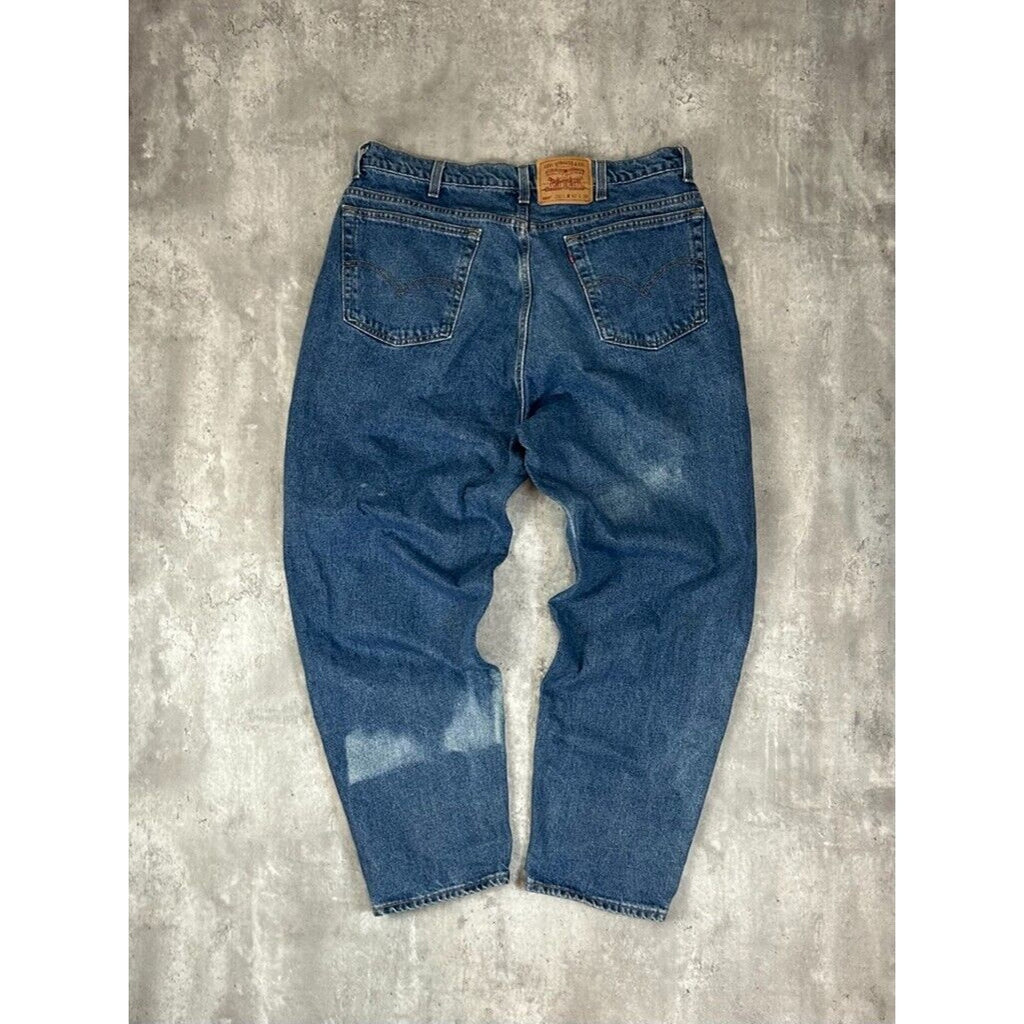 Vintage 90s Levis 560 Red Tab Loose Fit Tapered Leg Dark Wash Denim Pants Size 41