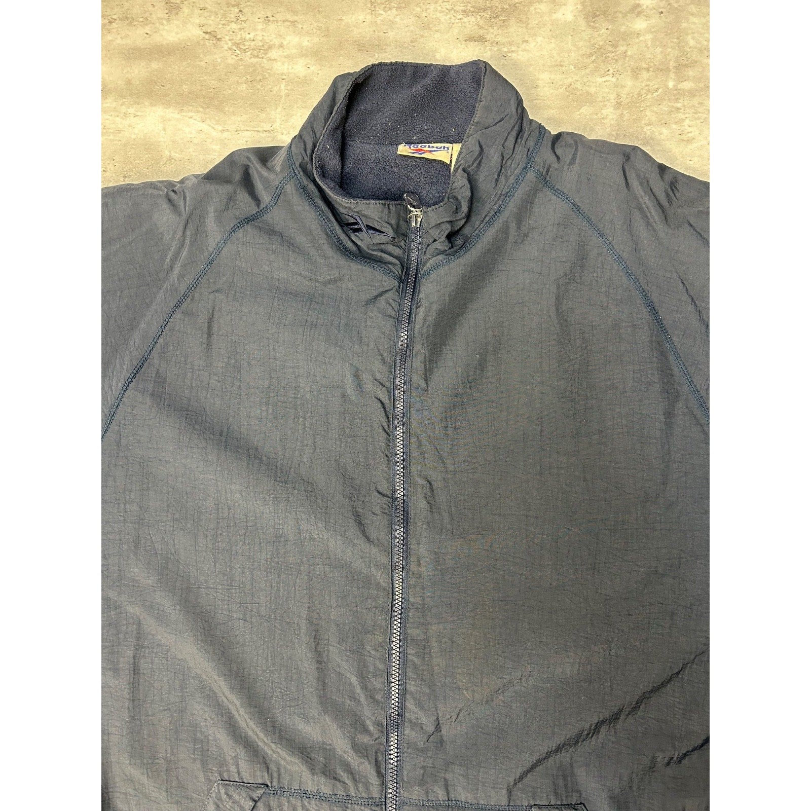 Vintage Reebok Embroidered Spellout Nylon Full Zip Windbreaker Jacket Size XL