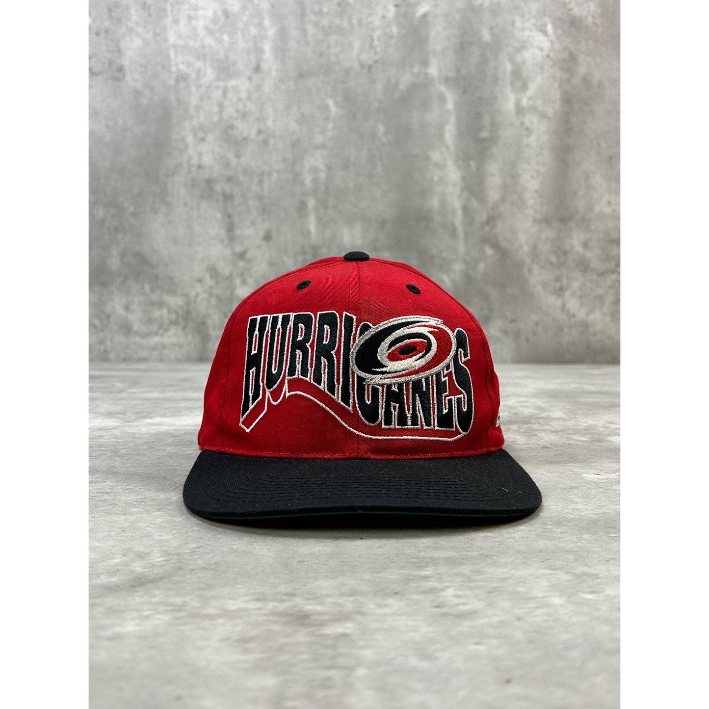 Vintage 90s Carolina Hurricanes NHL Embroidered Wave Spellout Snapback Hat OSFA