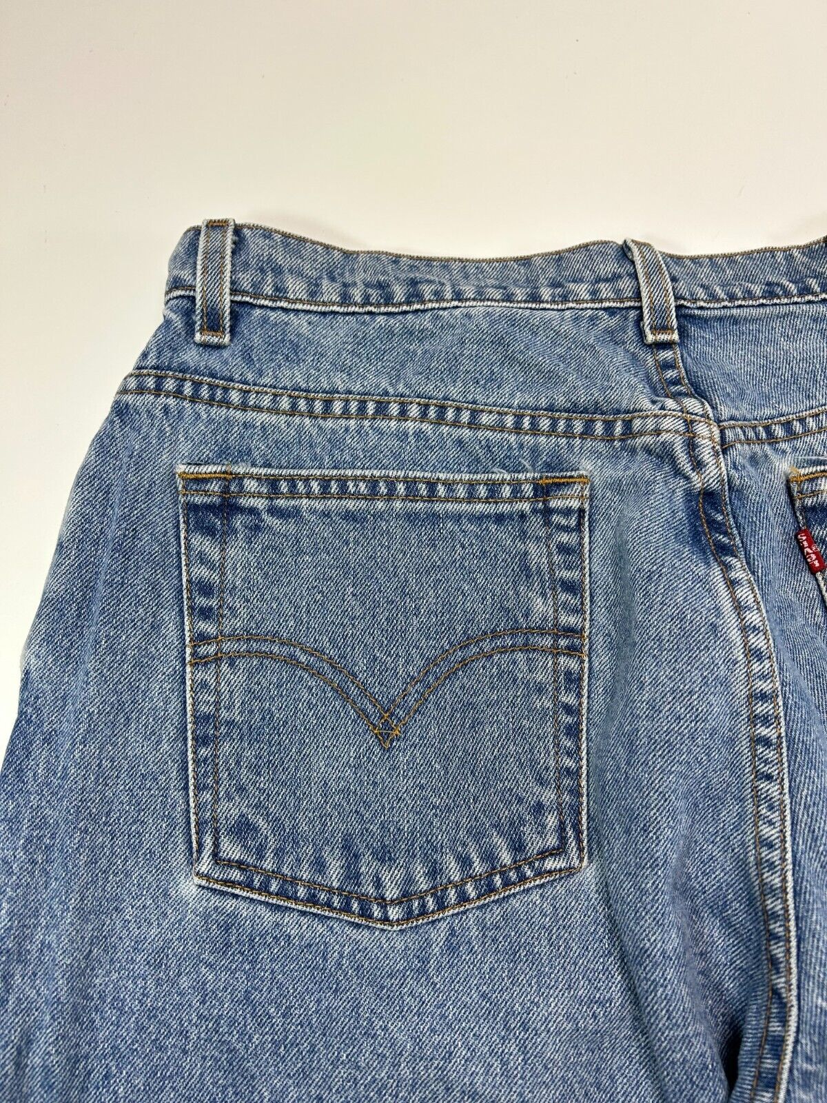 Vintage 90s Levis 550 Red Tab Relaxed Fit Light Wash Denim Pants Size 32W Blue