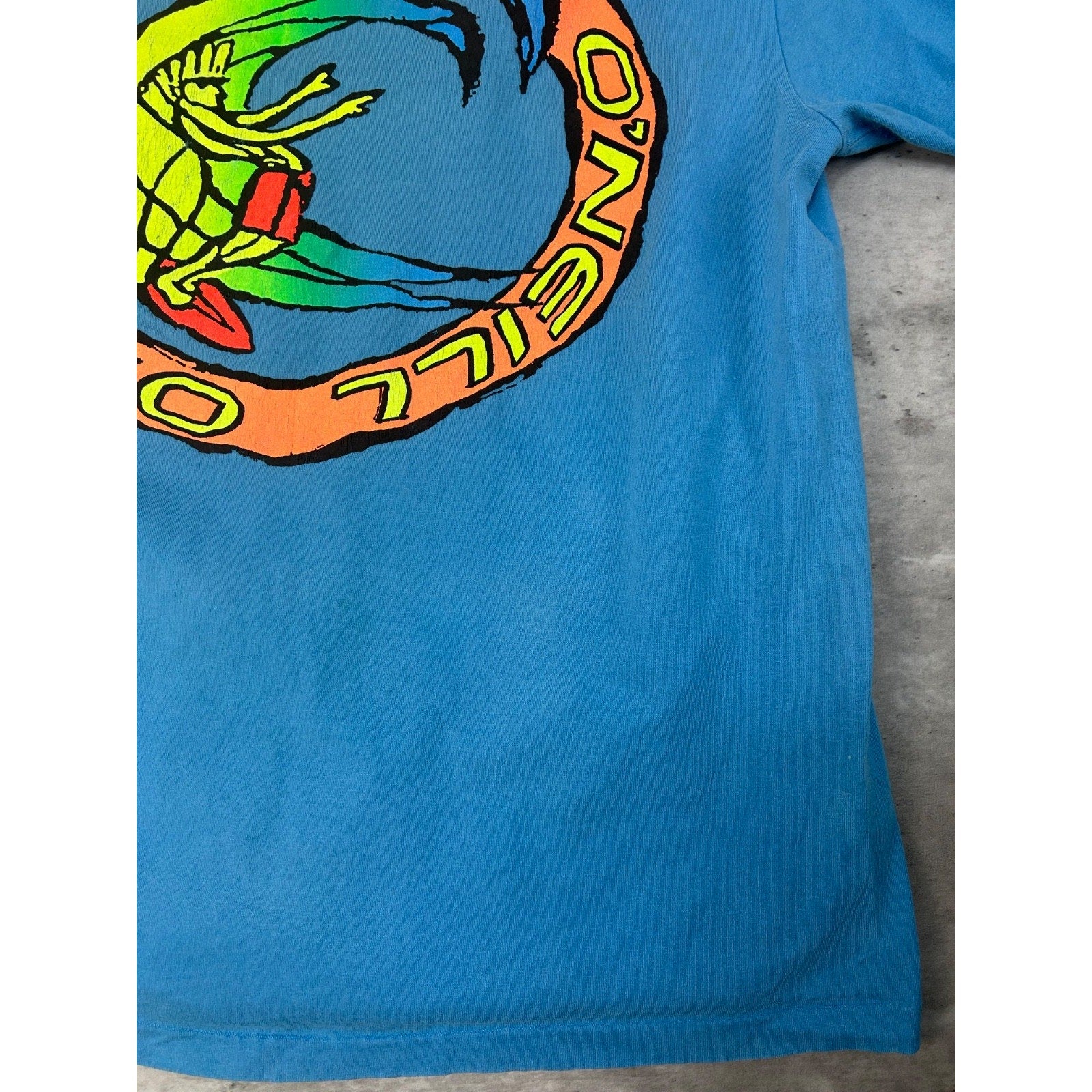 Vintage 90s O'Neill Cartoon Surfer Graphic Blue T-Shirt Size XL