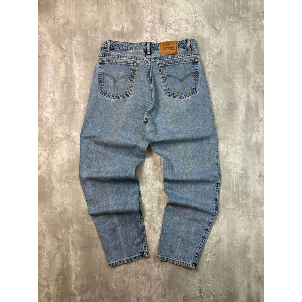 Vintage Levis 550 Red Tab Relaxed Fit Medium Wash Denim Pants Size 34