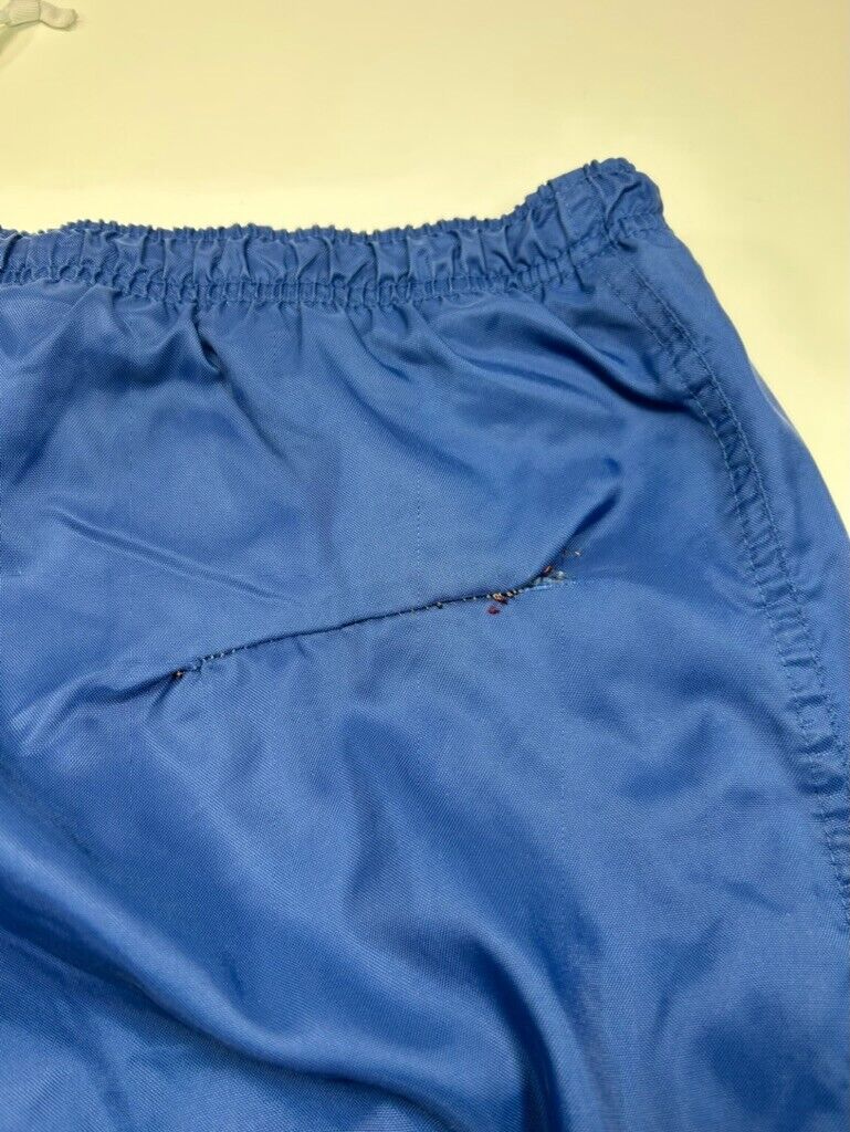 Vintage Y2K Nike Embroidered Mini Swoosh Nylon Windbreaker Pants Size XL Blue