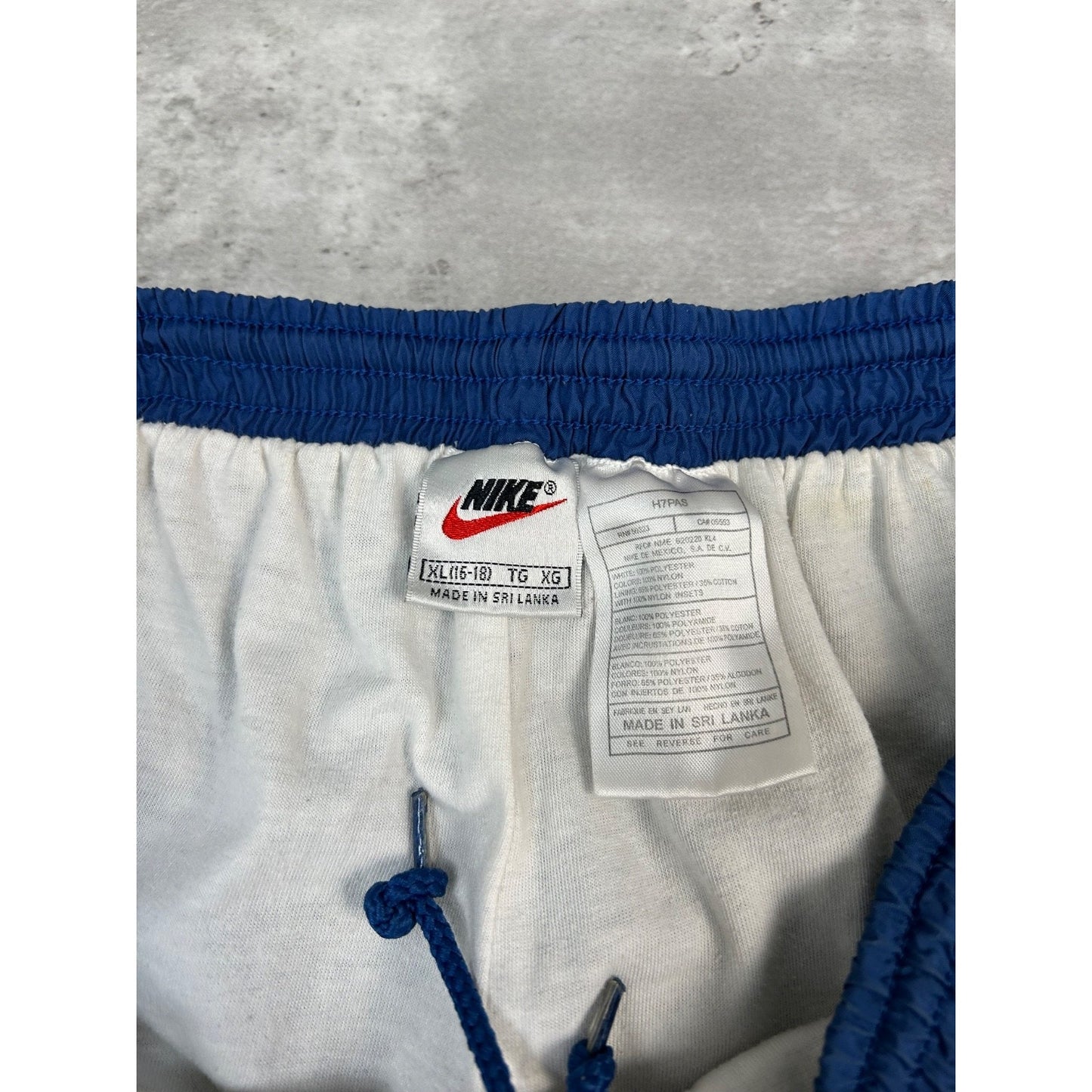 Vintage Nike Embroidered Mini Swoosh Splash Pants Size XL YOUTH Blue