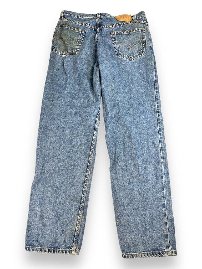 Vintage Levis 550 Red Tab Relaxed Fit Medium Wash Denim Pants Size 34W Blue