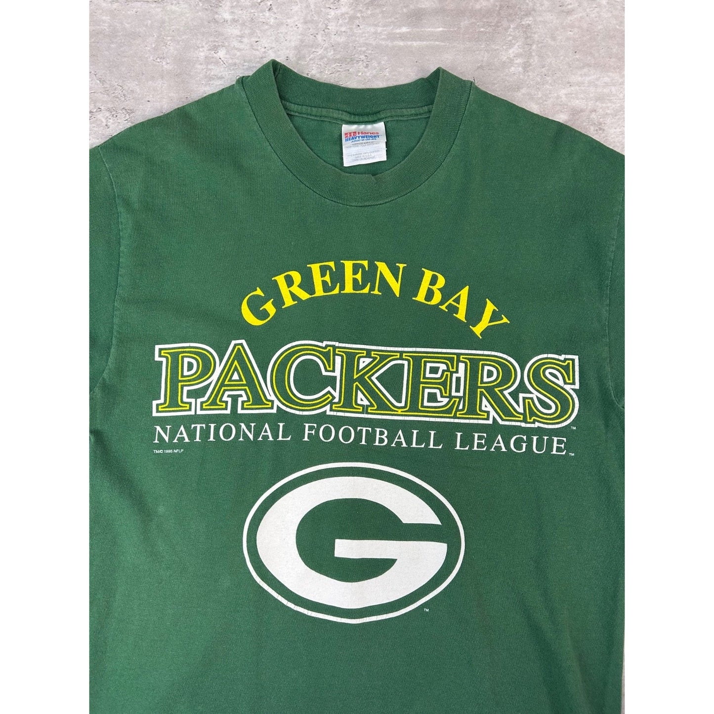 Vintage 90s Green Bay Packers NFL Spellout Graphic T-Shirt Size Medium