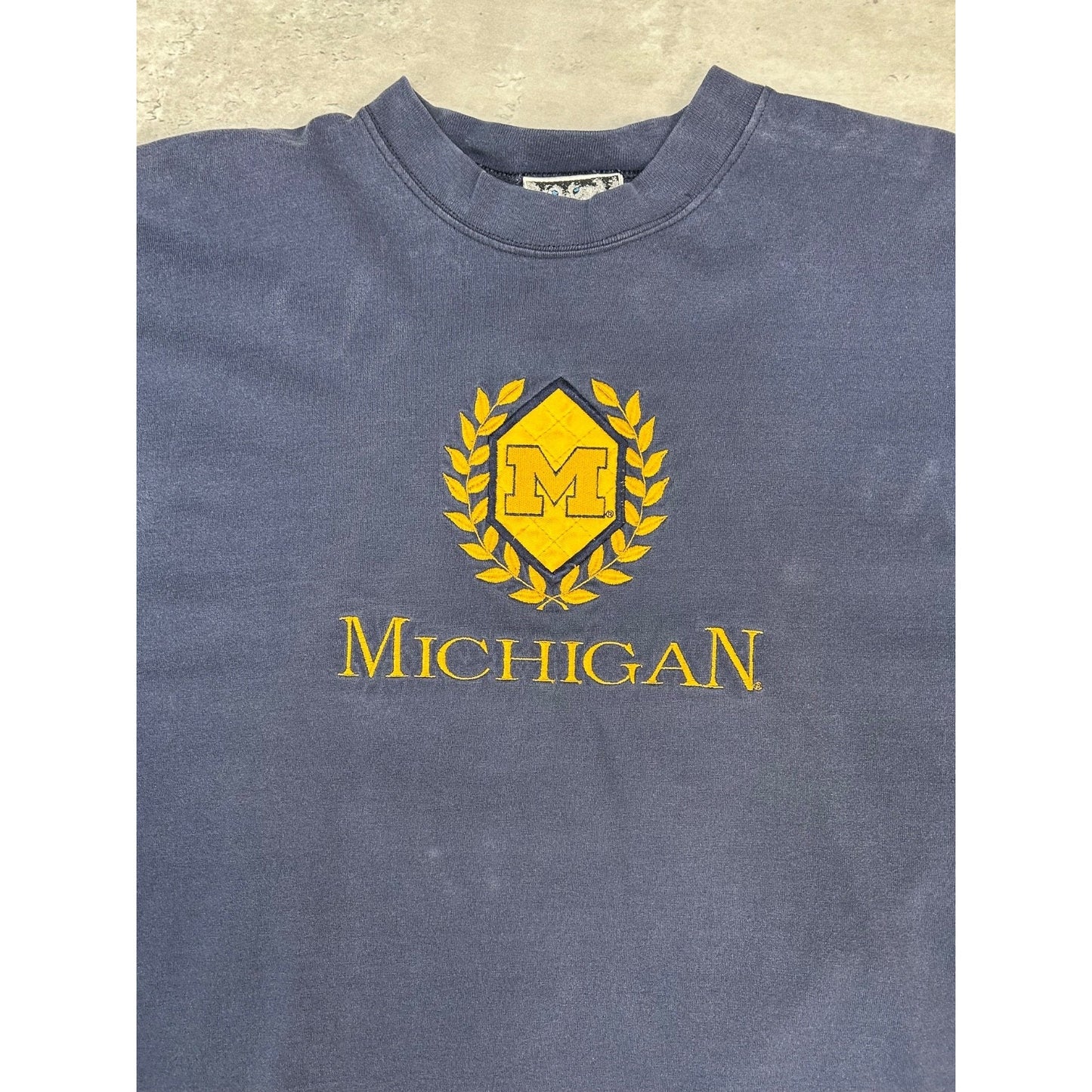 Vintage Michigan Wolverines NCAA Crest Graphic T-Shirt Size XL Blue