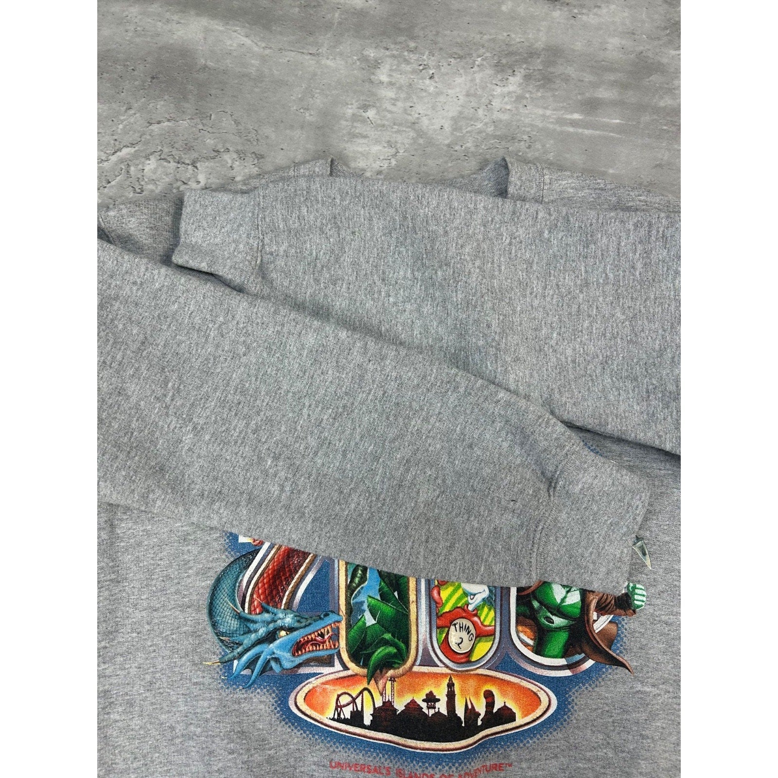 Vintage 2006 Universal Studios Cartoon Graphic Spellout Sweatshirt Size Small