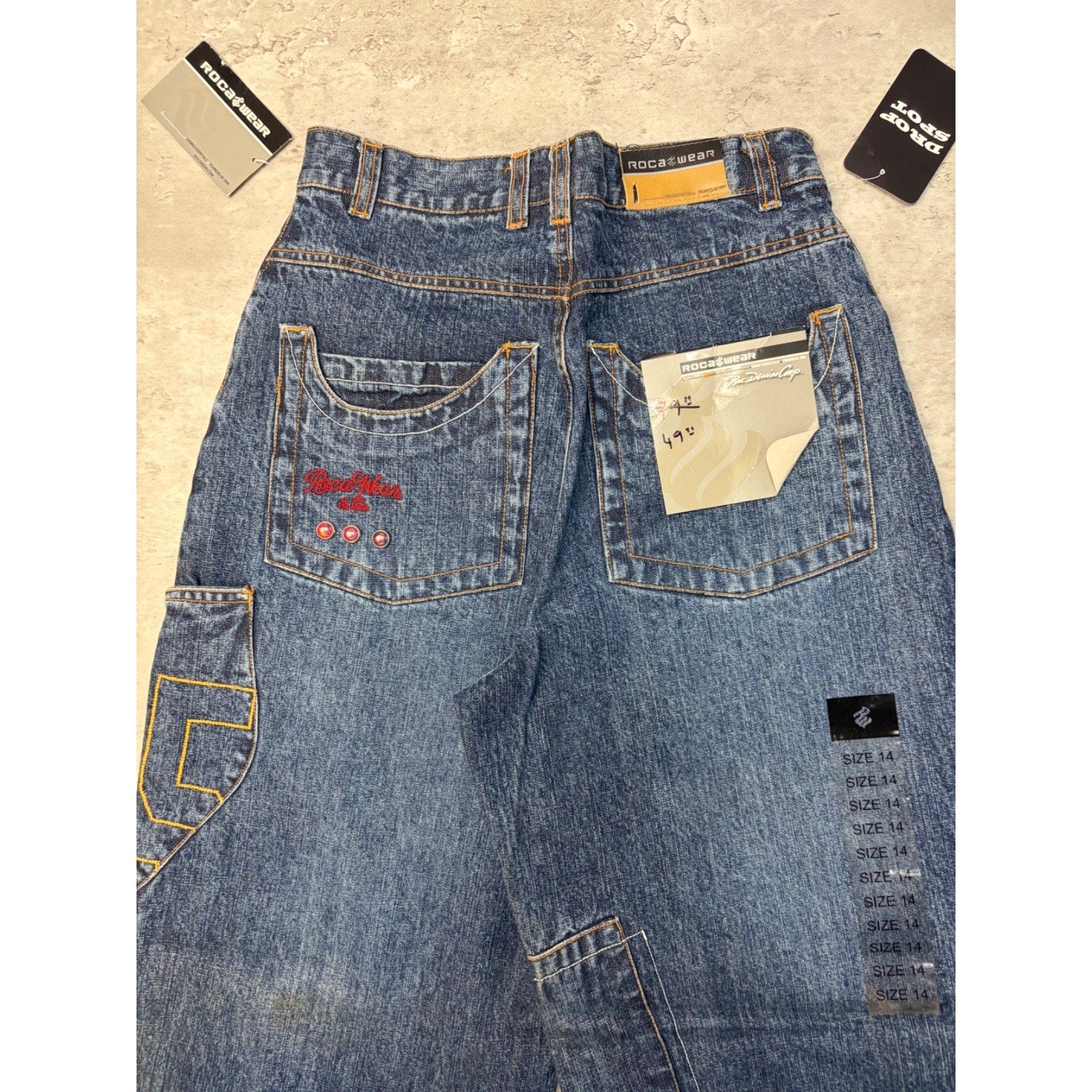 Vintage Y2K Womens Rocawear La Familia Embroidered Medium Wash Denim Pants 26x29