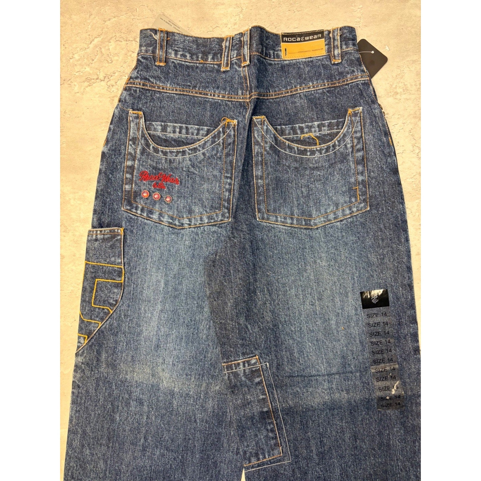 Vintage Y2K Womens Rocawear La Familia Embroidered Medium Wash Denim Pants 26x29