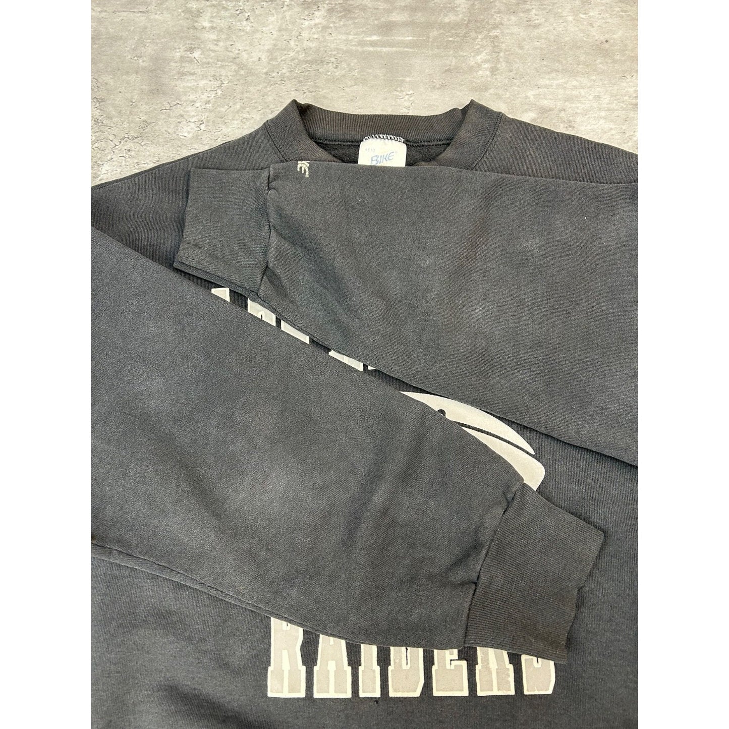 Vintage 90s Los Angeles Raiders NFL Spellout Graphic Football Sweatshirt Size XL