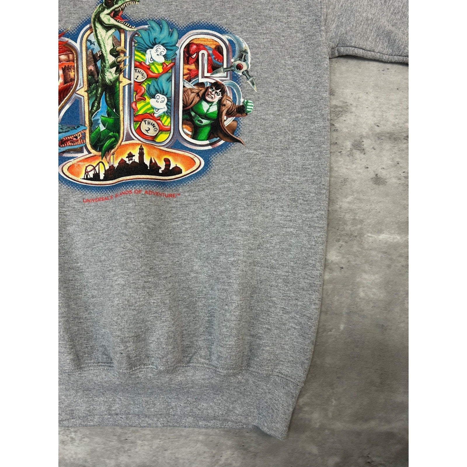 Vintage 2006 Universal Studios Cartoon Graphic Spellout Sweatshirt Size Small