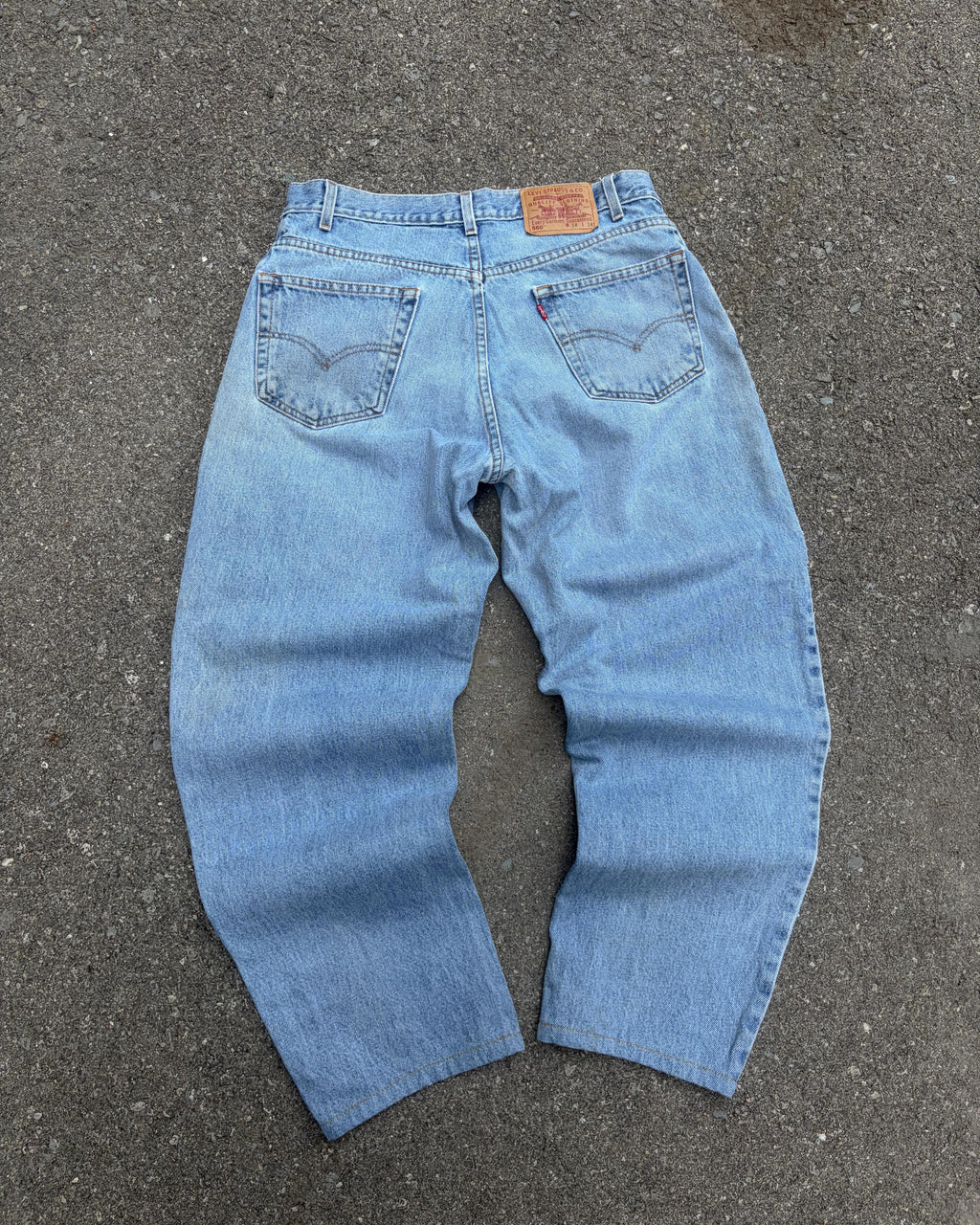 Vintage 90s Levis 560 Red Tab Relaxed Fit Tapered Light Wash Denim Pants Size 32