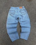 Vintage 90s Levis 560 Red Tab Relaxed Fit Tapered Light Wash Denim Pants Size 32
