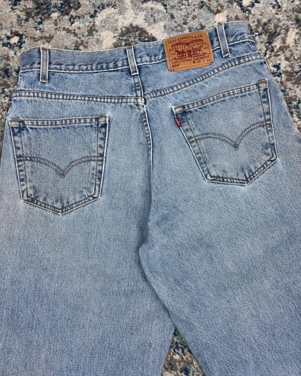 Vintage 90s Levis 560 Red Tab Relaxed Fit Tapered Light Wash Denim Pants Size 32