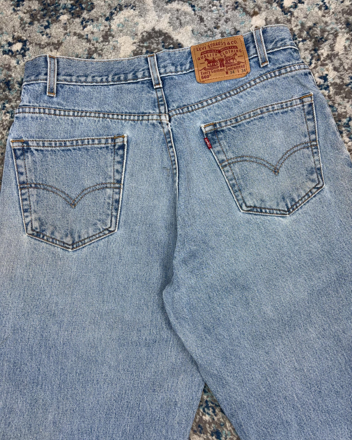 Vintage 90s Levis 560 Red Tab Relaxed Fit Tapered Light Wash Denim Pants Size 32
